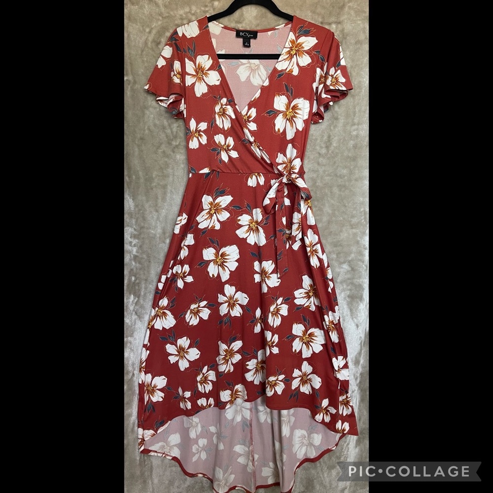 Orange white white flower dress.